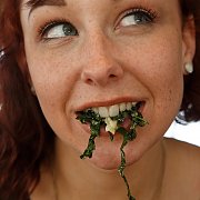Freckled Canadian Amateur With Food In Mouth