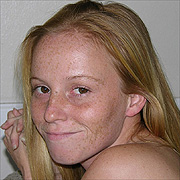 Young Freckled Face Ginger Over Shoulder Smirk