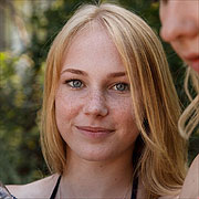 Cute Teen Freckled Face Girl Posing With A Smirk